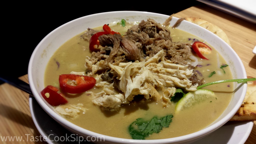 Thai Hot Pot, Yellow coconut curry broth, roasted pork and shredded chicken provide a filling and flavorful entree. Available for a limited time. 