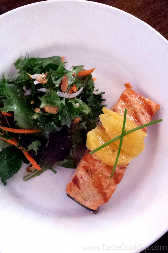 Citrus Salmon - Grilled filet of Atlantic with mixed greens, carrots, orange segments & toasted almonds tossed in a citrus herb vinaigrette.