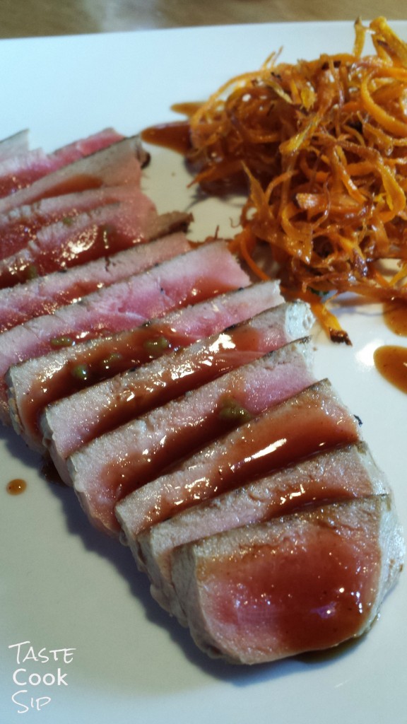 Ahi Tuna appetizer, seared yellowfin tuna with Wasabi BBQ drizzle & sweet potato crisps $11