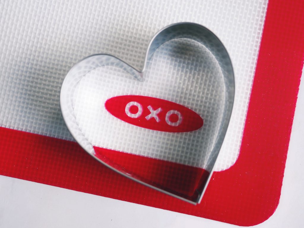 OXO Silicone mat with heart cookie cutter